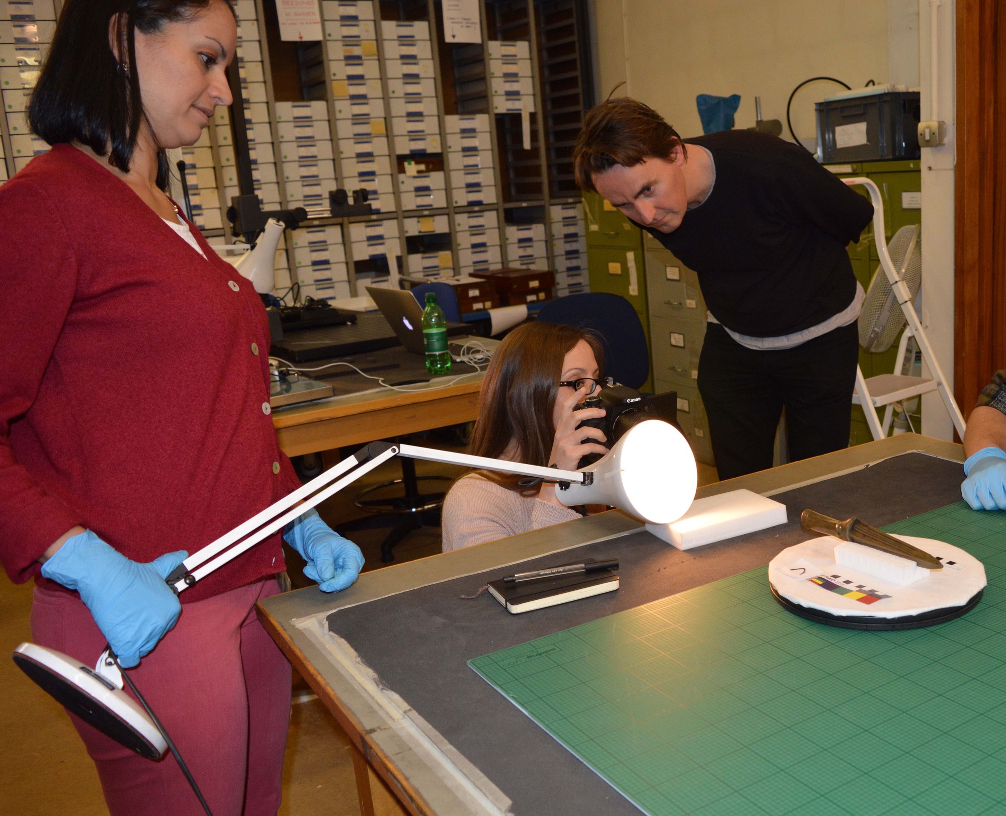 Adi, Chiara, & Andy preparing a decorated socketed spearhead from the hoard for 3D scanning